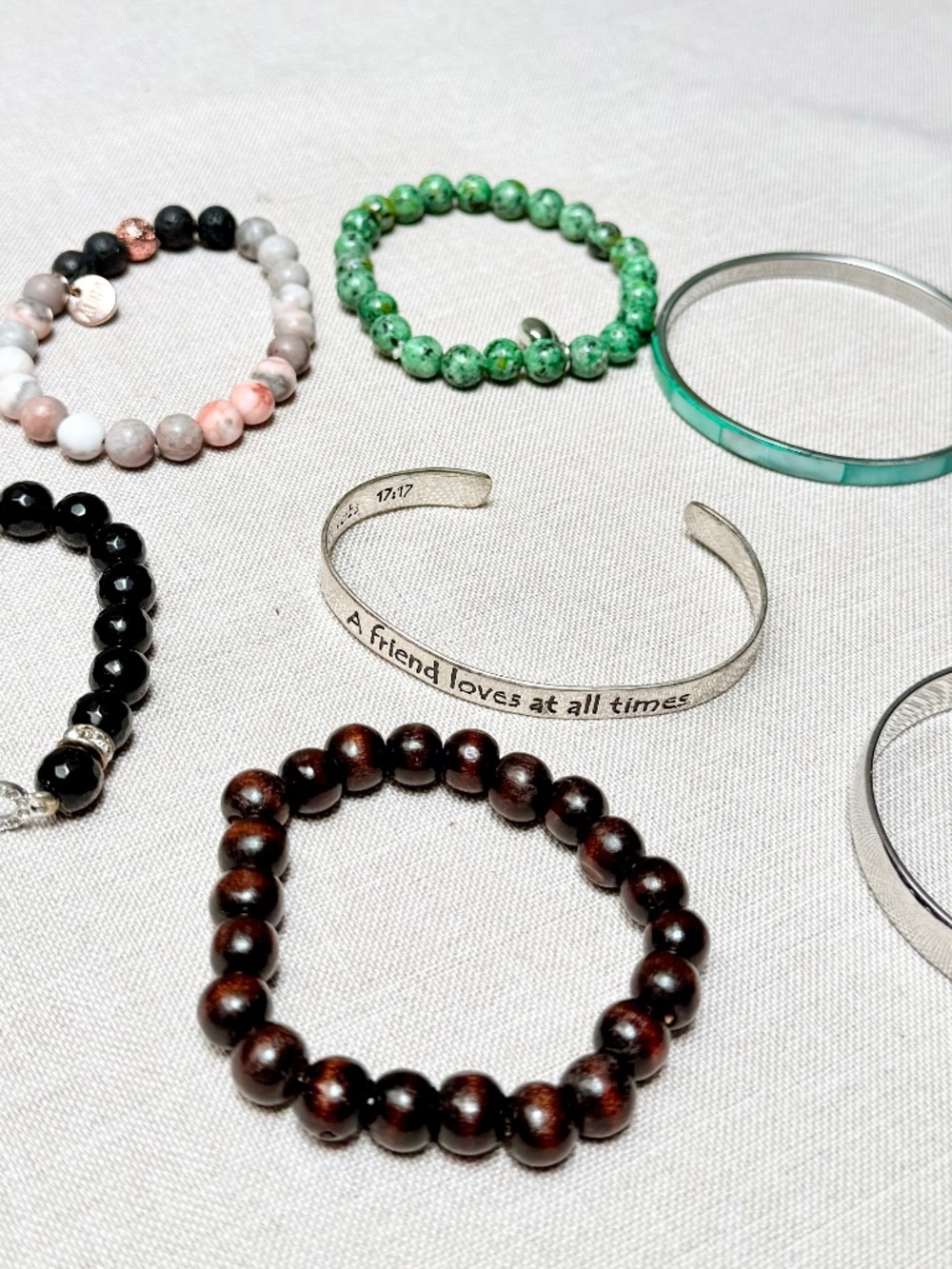 Assortment of 7 Beaded and Metallic Bracelets Aura Monet